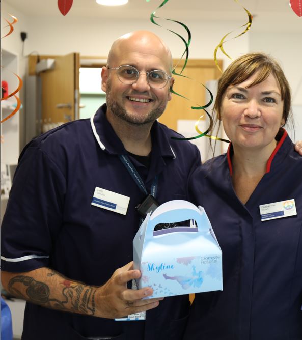 Paediatric nurses holding a children's snack box