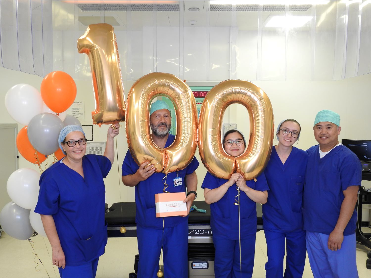 Professor Ali Ghoz and team celebrating the treatment of 100 patients with Arthrosamid