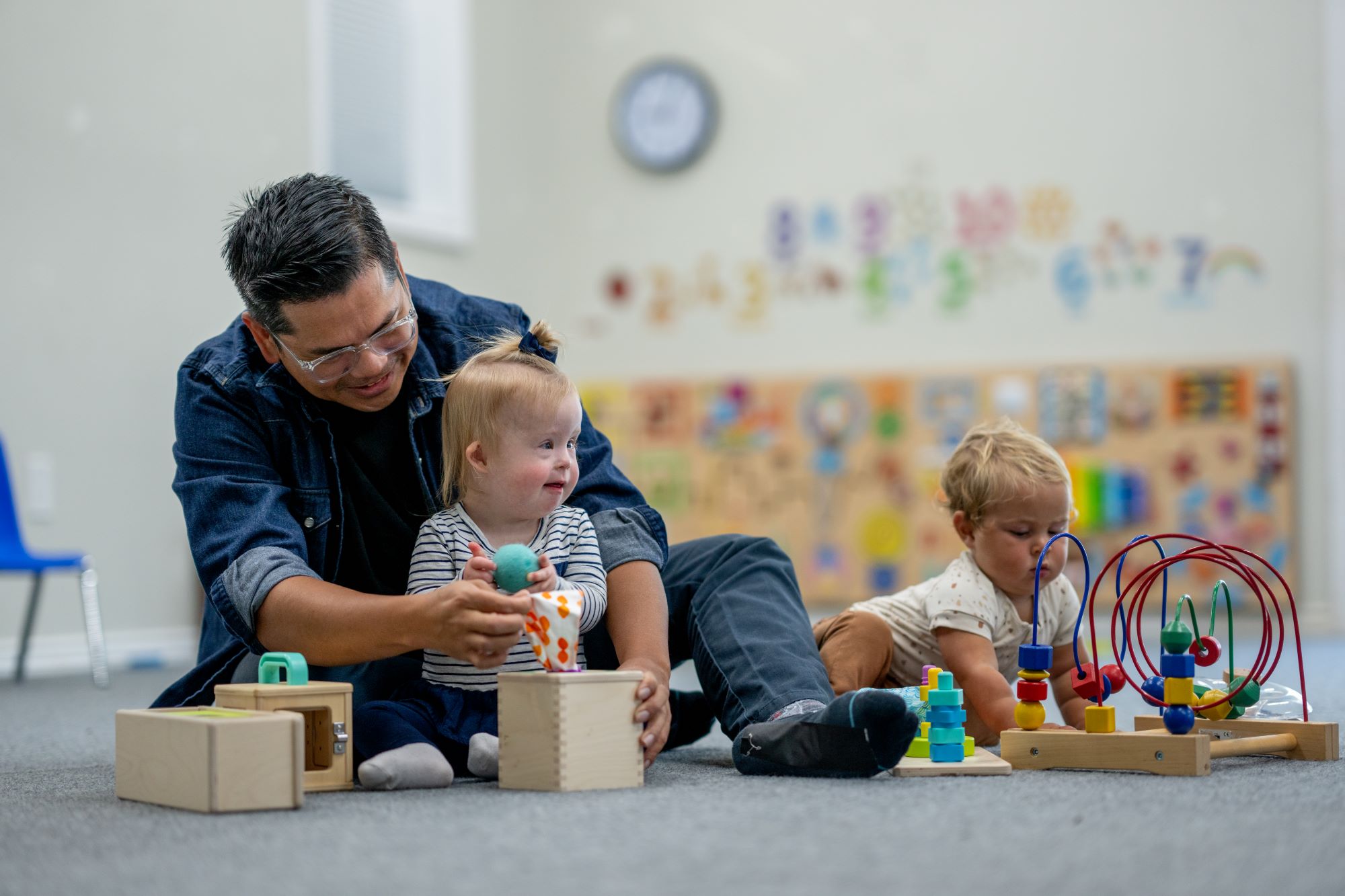 Young children playing with toys at a daycare