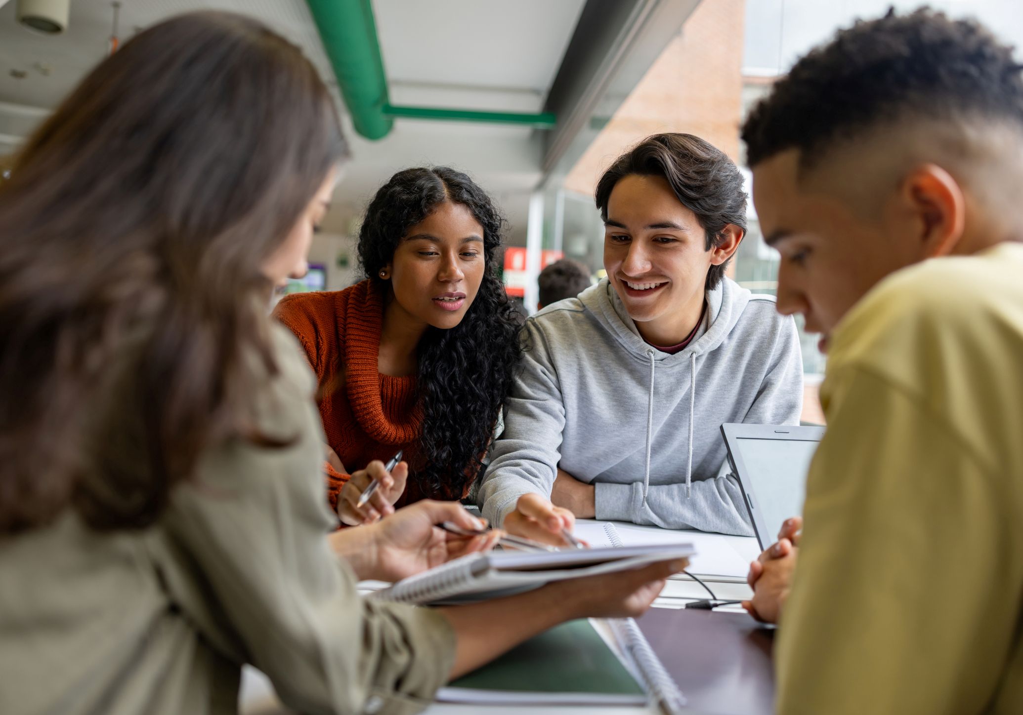 Four students studying together
